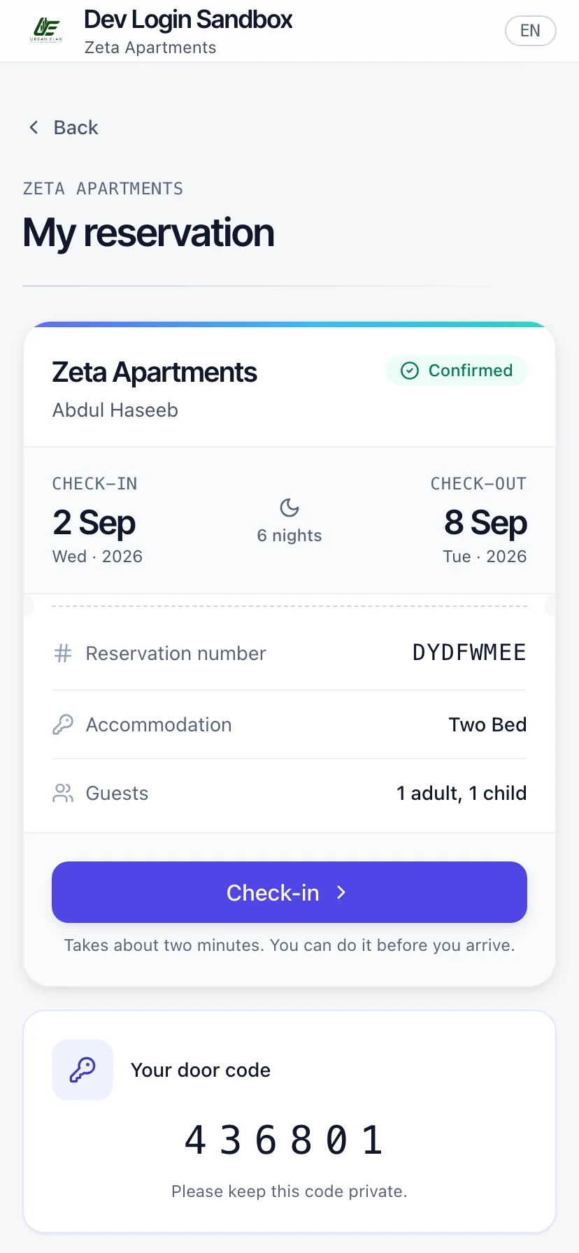 The guest app's reservation screen on a phone, showing the stay and the released door code