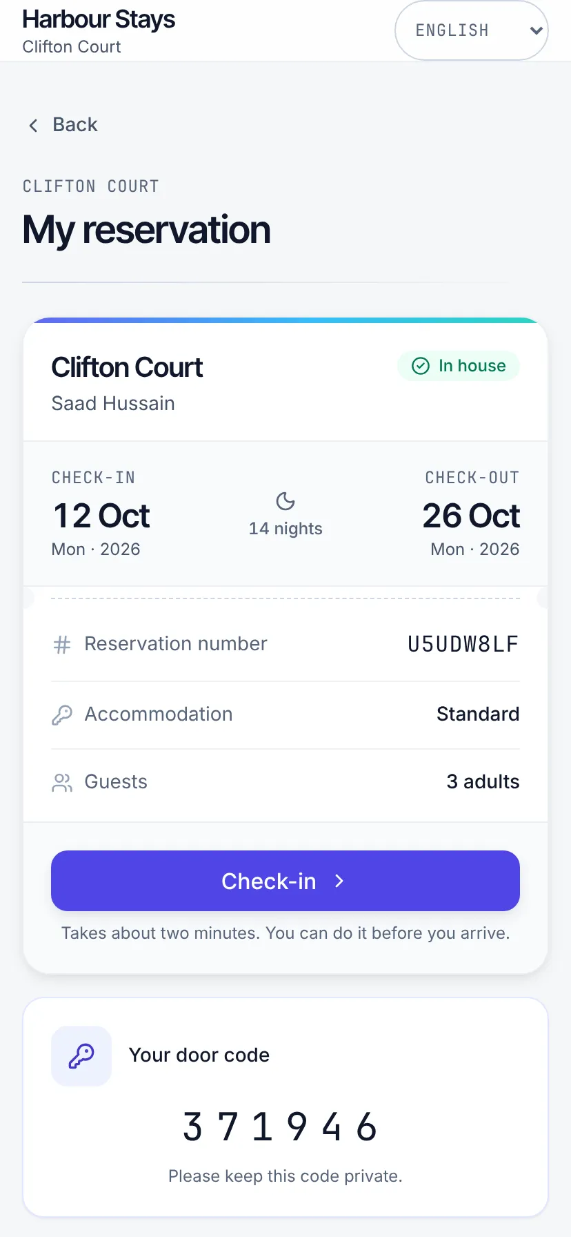 The guest app's reservation screen on a phone, showing the stay and the released door code