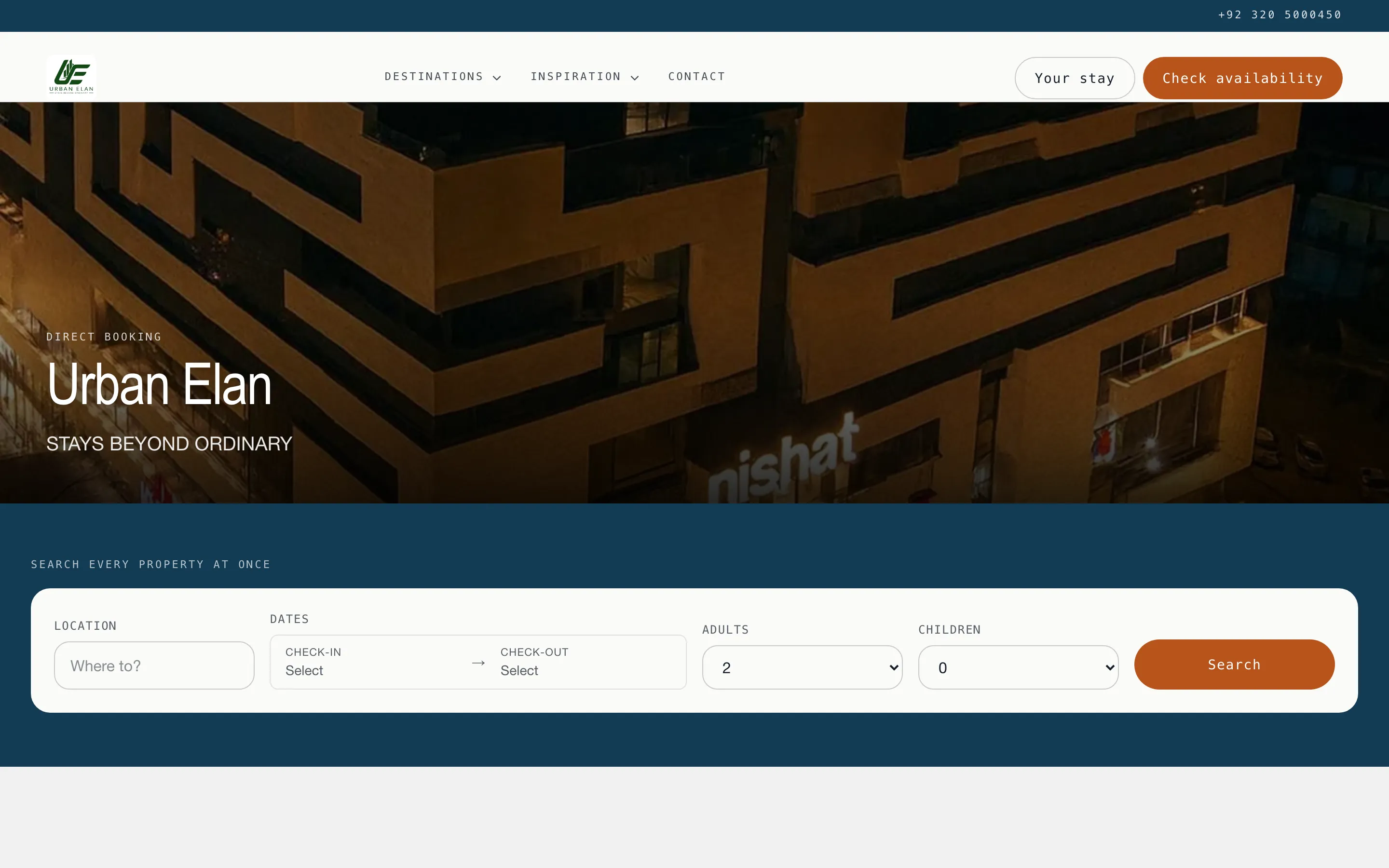A live Stay N Host booking site: brand header, photographic hero, and a search across every property